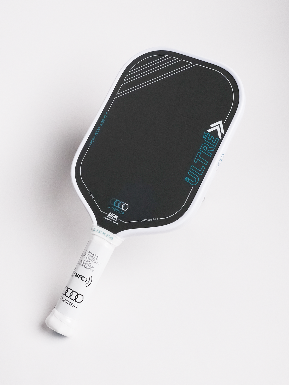 11Six24 Ultré Power 2 pickleball paddle, white colourway, angled view showing the hybrid shape and white edge guard